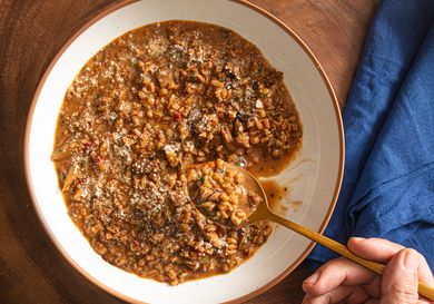 Overhead view of lifting a bite of farrotto