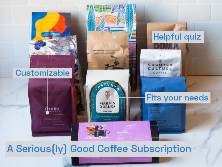 Numerous bags of coffee on a kitchen countertop.