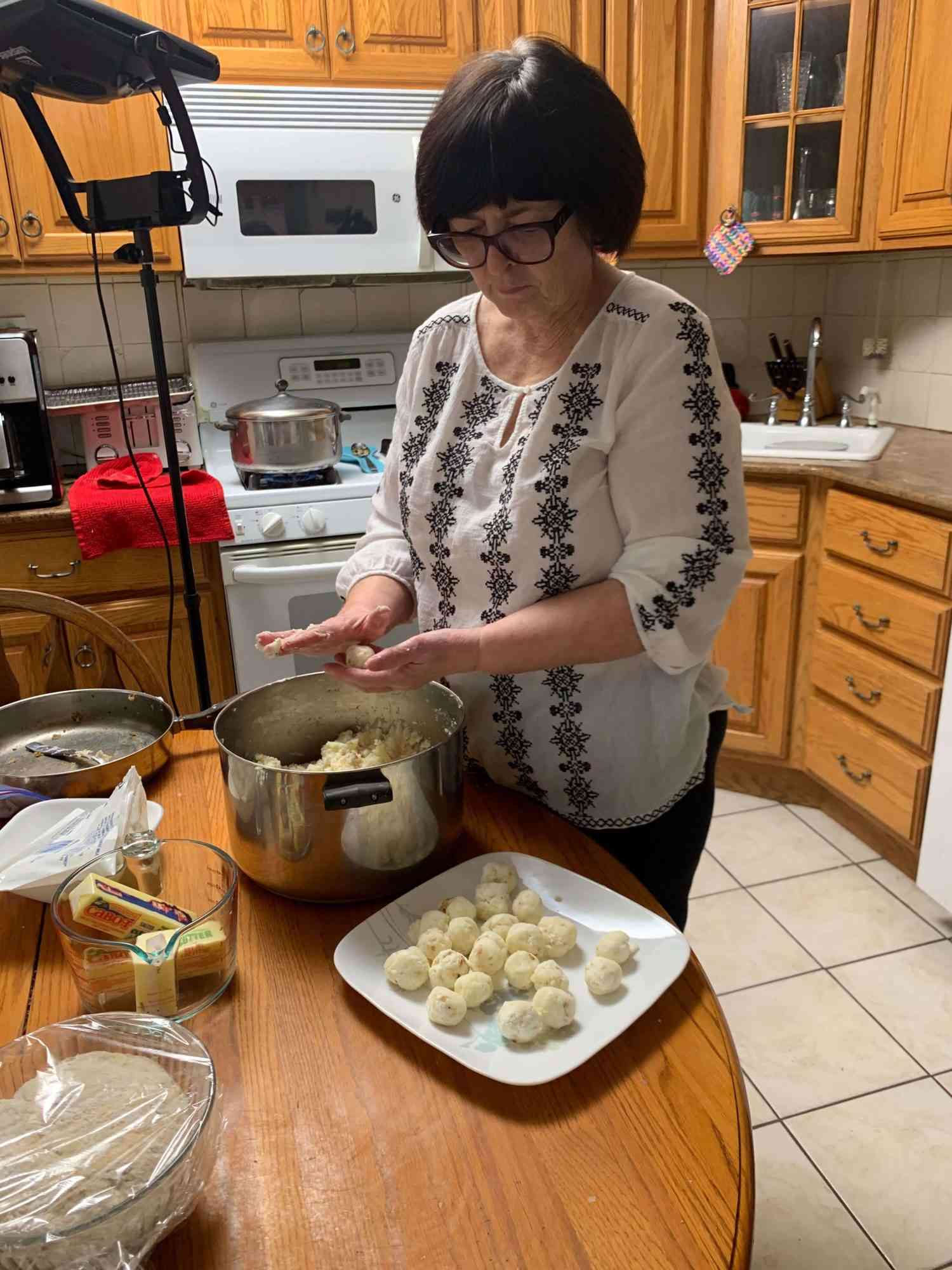 Vicky's mom making pierogi