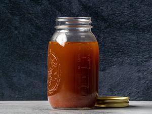 Pressure cooker beef stock in a jar