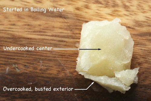 close-up of a piece of potato started in boiling with overcooked exterior and undercooked center