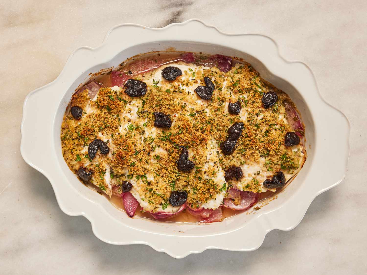 Overhead view of baked Sicilian style cod