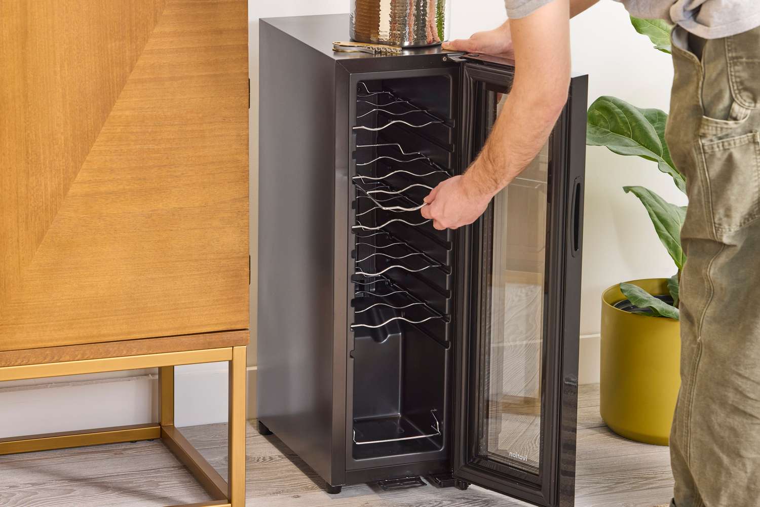 Person opening Ivation 12 Bottle Compressor Wine Cooler Refrigerator 