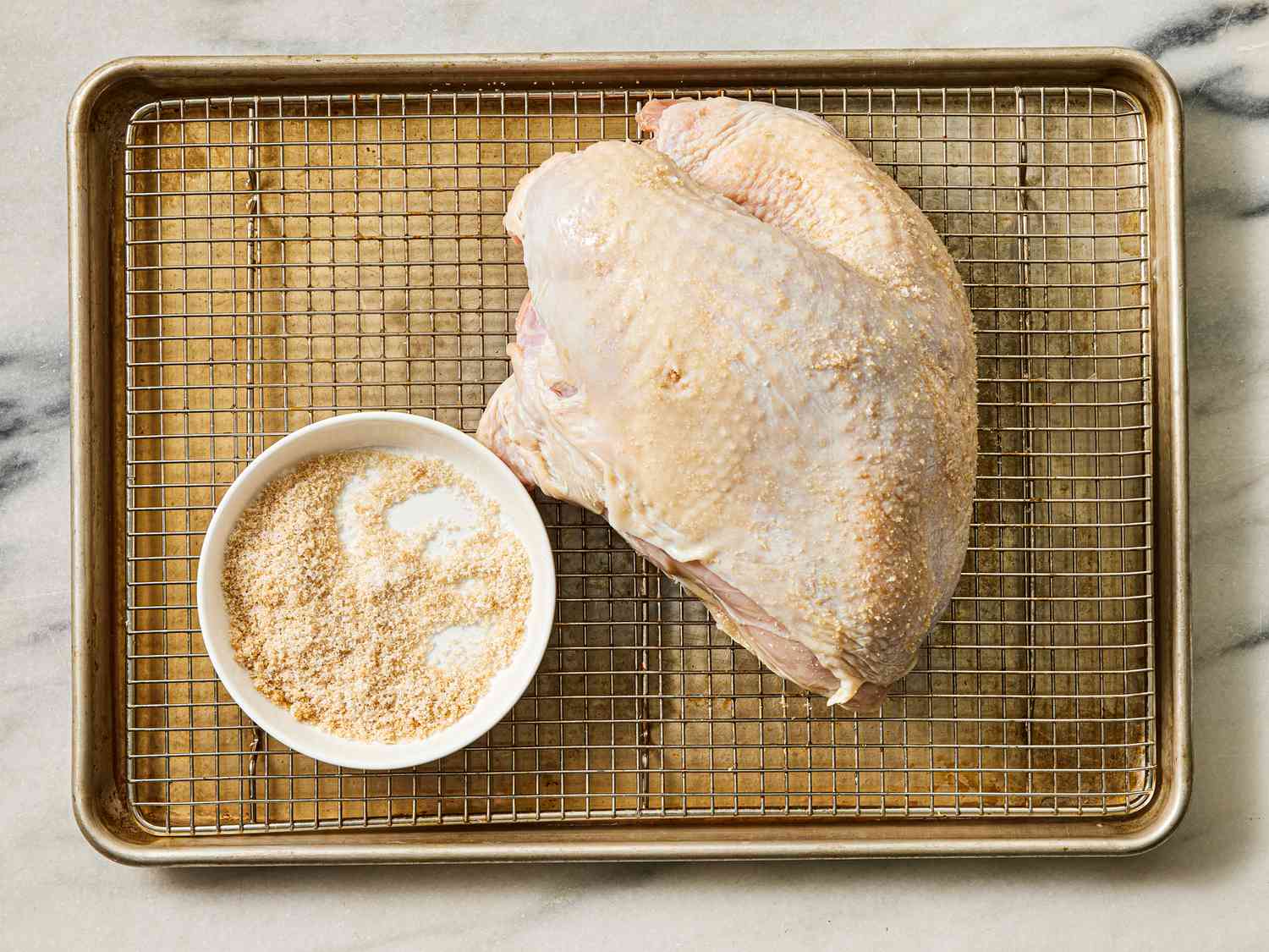 Overhead view of turkey rubbed with mixture