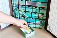 the Bokksu Advent Calendar with a drawer pulled out showing Japanese tea