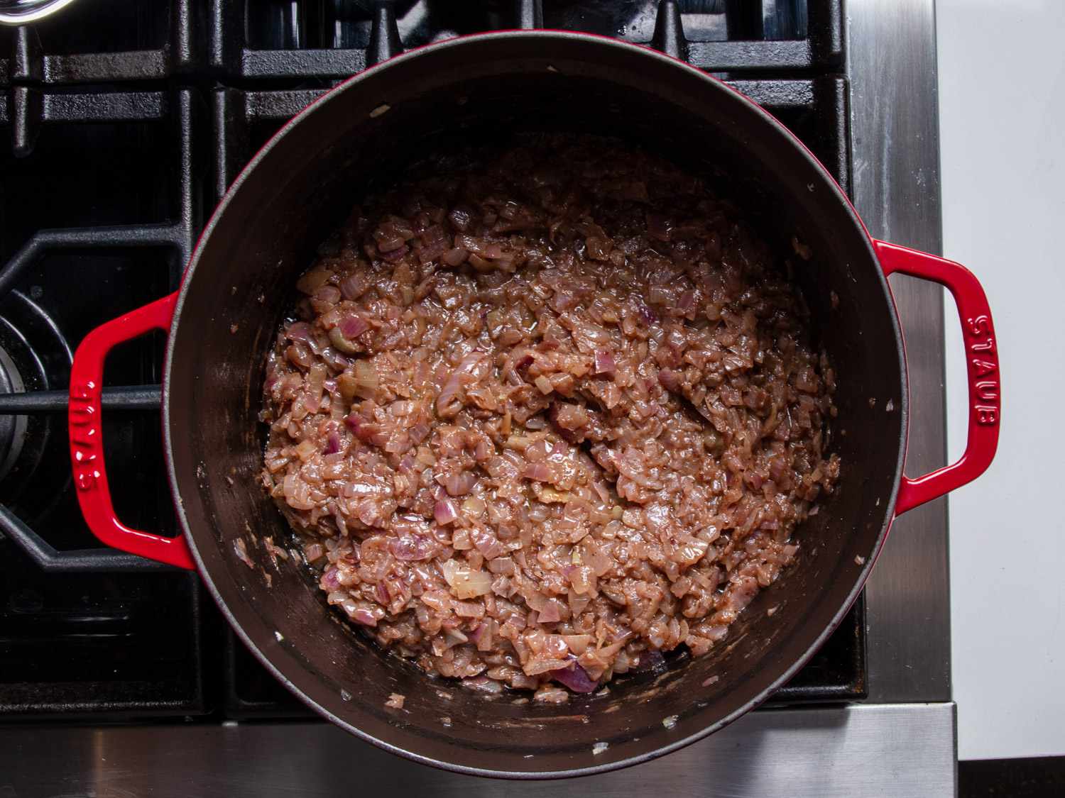 Seasoned onions cooking down.