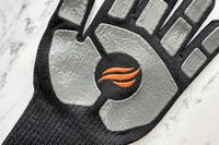A fire graphic on the palm of the Blackstone Griddle Glove