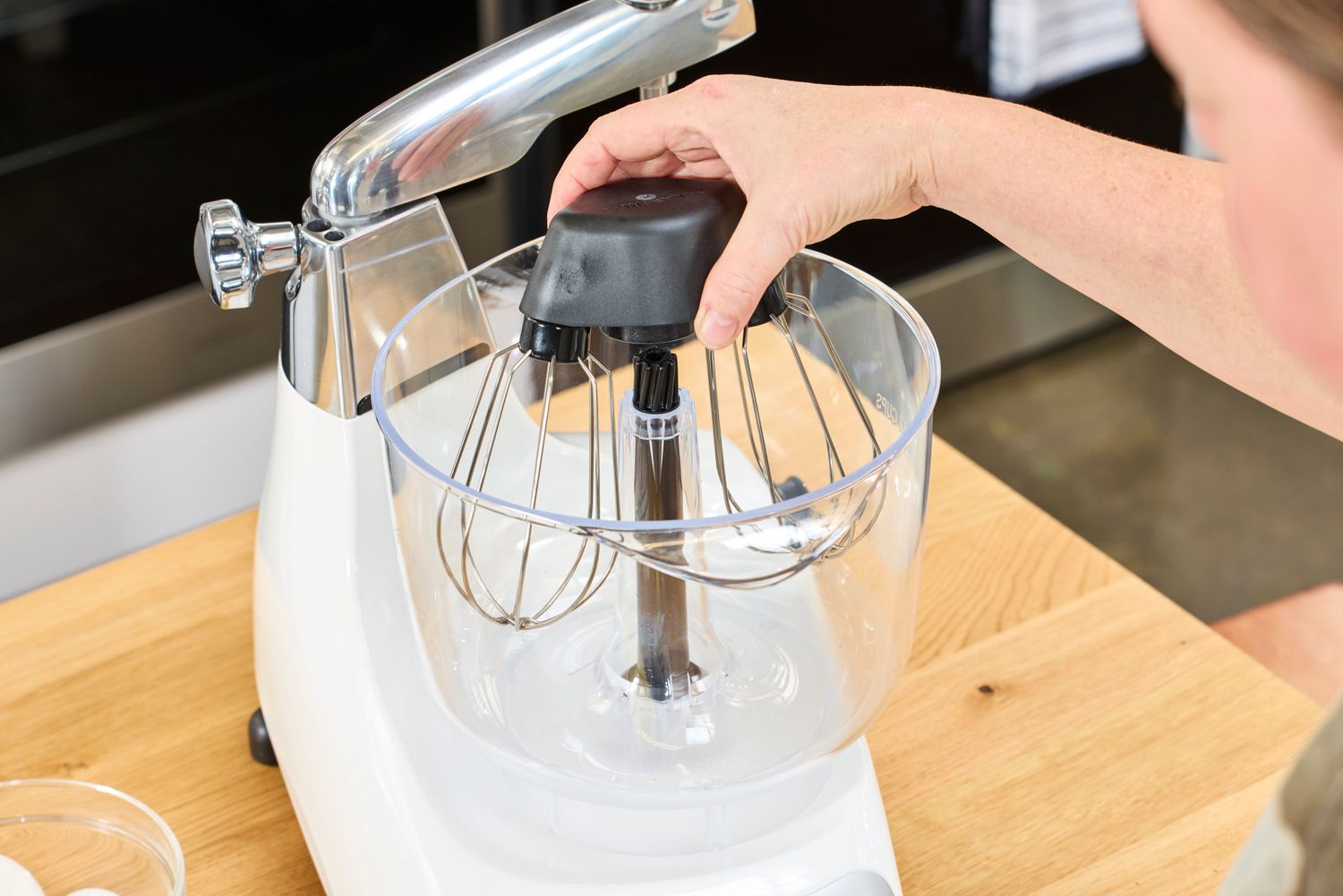 Tester adjusting Ankarsrum Stand Mixer