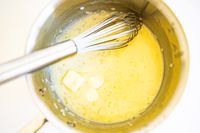 Food cooking in a pot from the All-Clad D3 3-Ply Stainless Steel Cookware Set 10 Piece