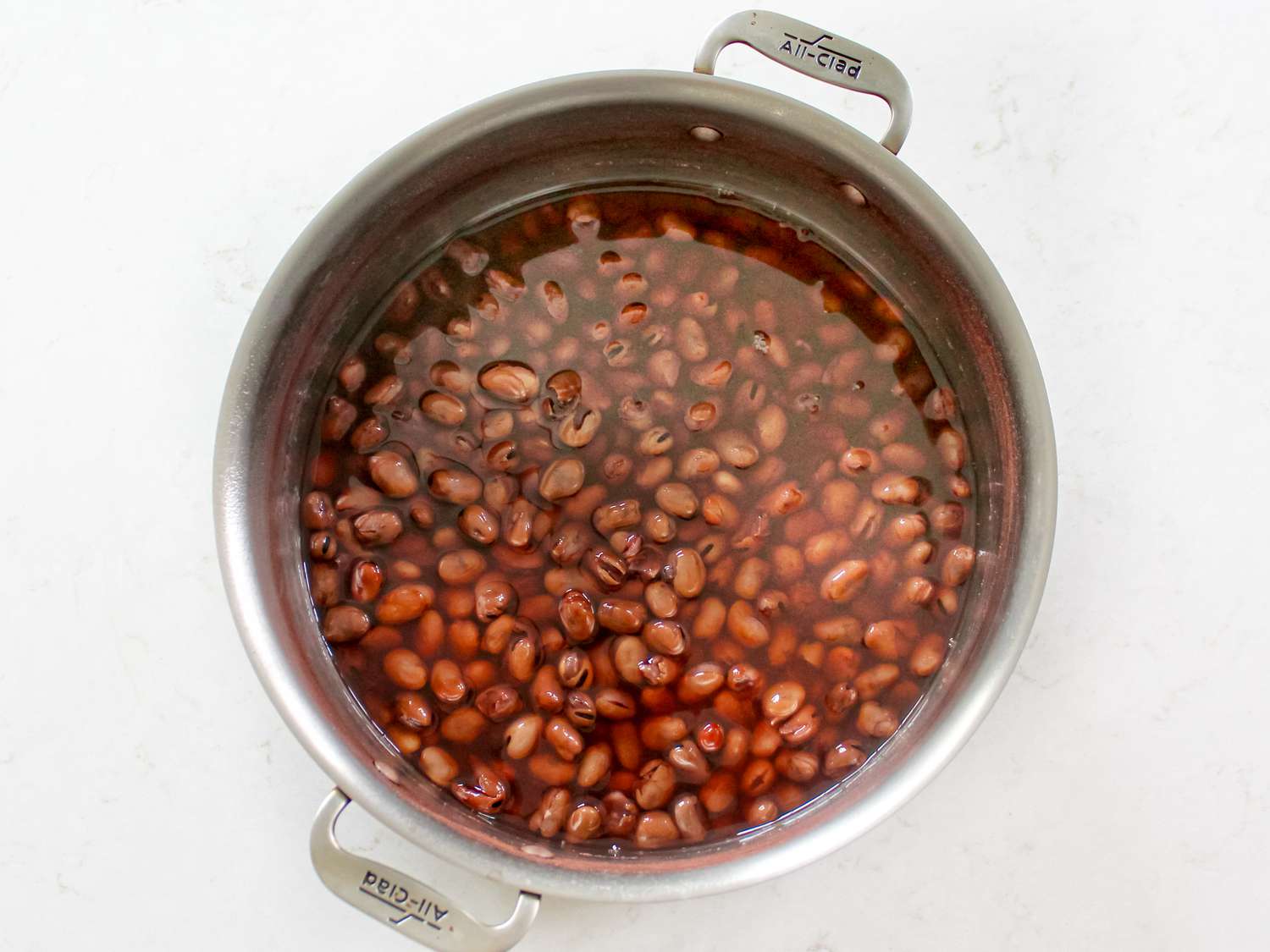 Overhead view of fava beans in pot