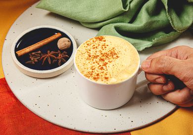 Side view of a pumpkin spice latte