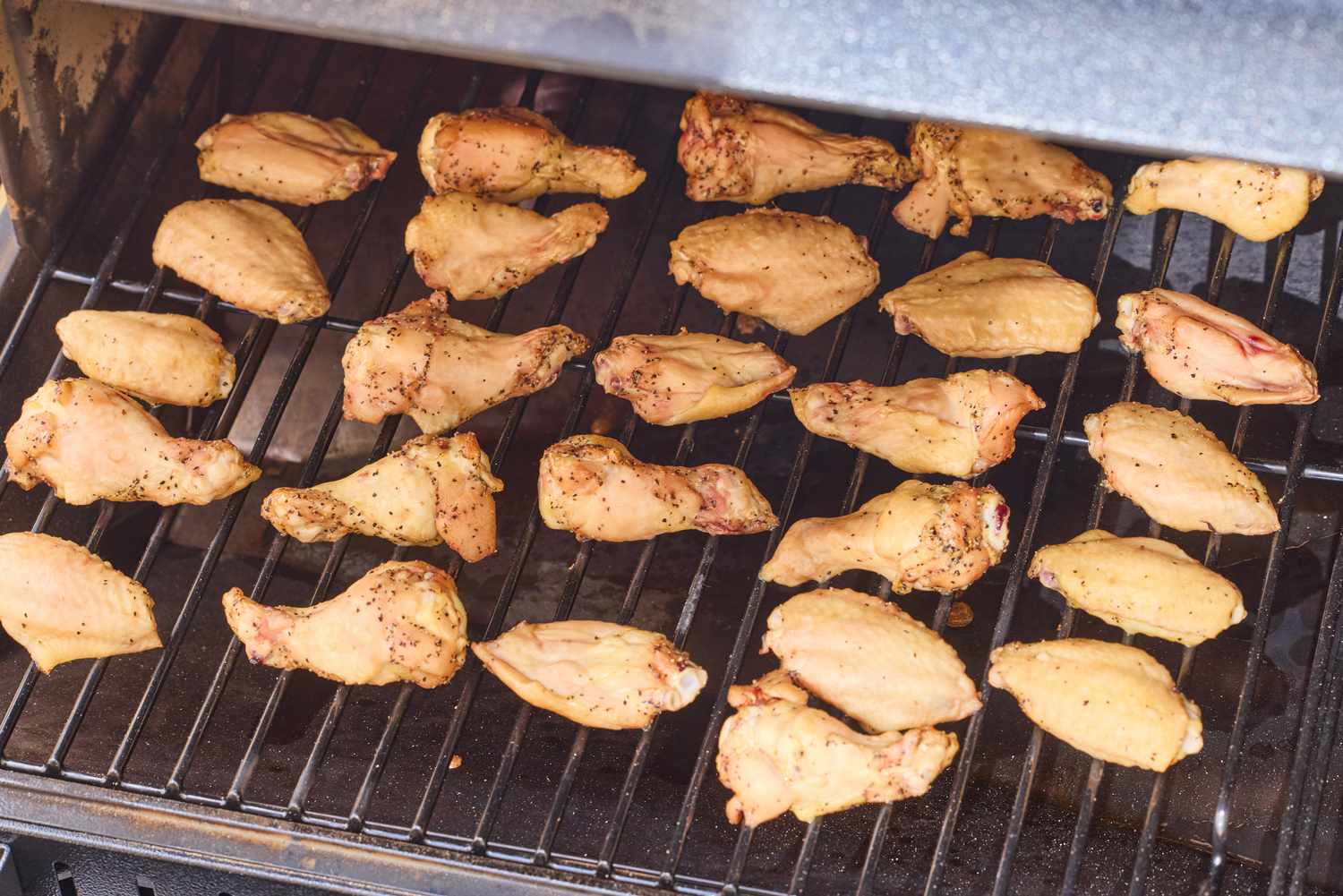 Chicken wings are cooked in the Traeger Woodridge Pro