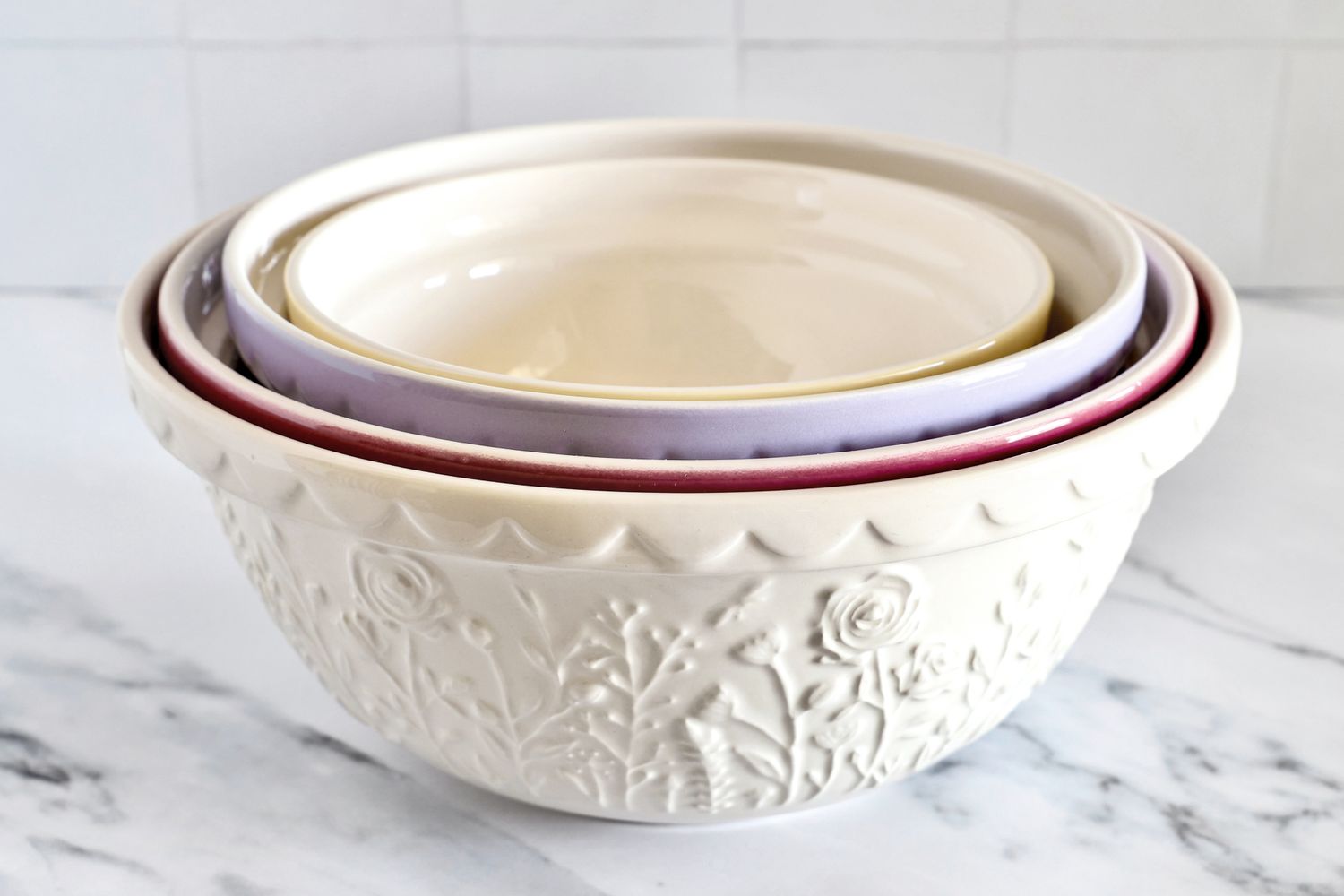 A set of Mason Cash stacking bowls placed on a countertop