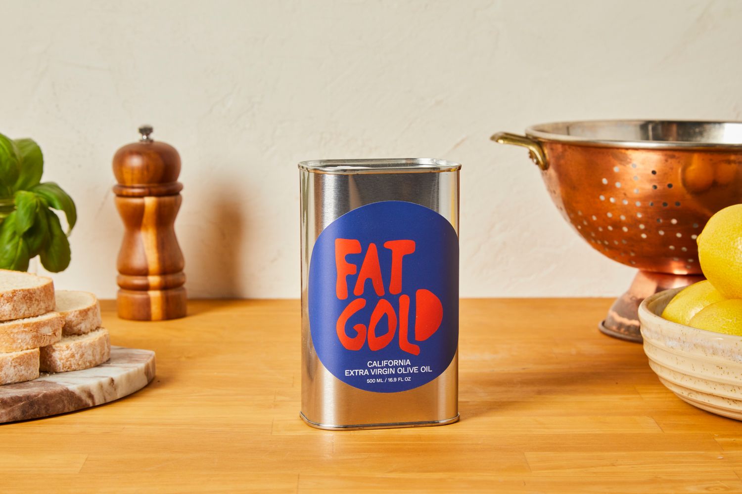 A tin of Fat Gold olive oill