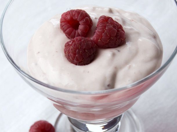A parfait glass of raspberry fool.