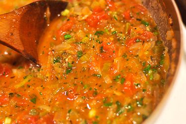 Close up view of Creole sauce in a saucepan. 