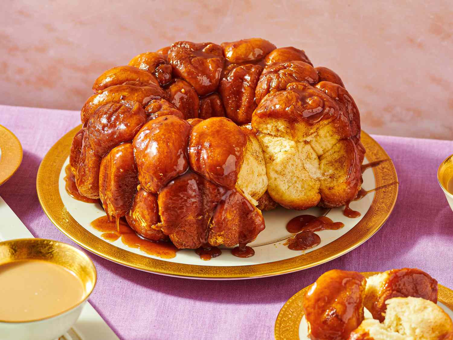 Monkey bread on a plate, served on a table with other dishes