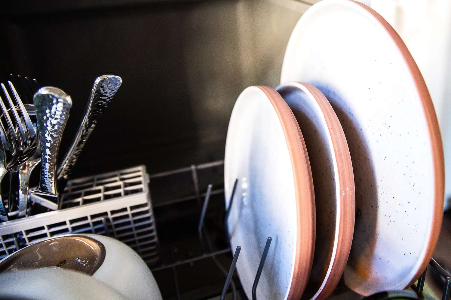 Clean dishes in a countertop dishwasher.