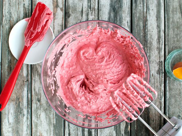 Whipping fruit mousse with a handheld mixer