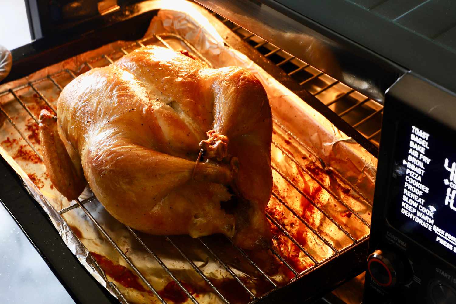 a roast chicken in a countertop oven