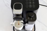 Espresso being dispensed into a mug by the Nespresso Gran Lattissima Original Espresso Machine by De’Longhi