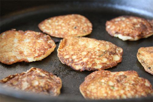 Cooking golden-brown naga-imo pancakes in a skillet.