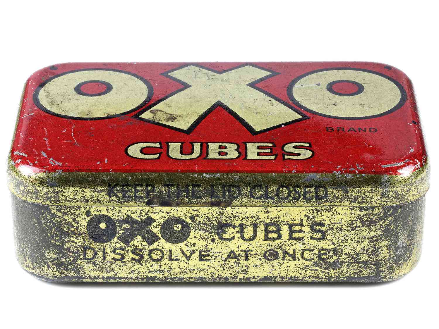A vintage OXO cubes tin isolated on white background