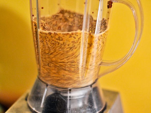 Soaked mustard seeds and vinegar blended in a blender