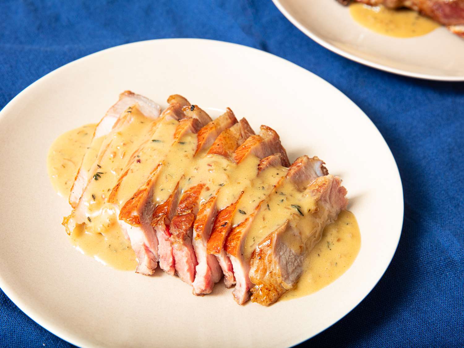 Side view of sauced pork chops