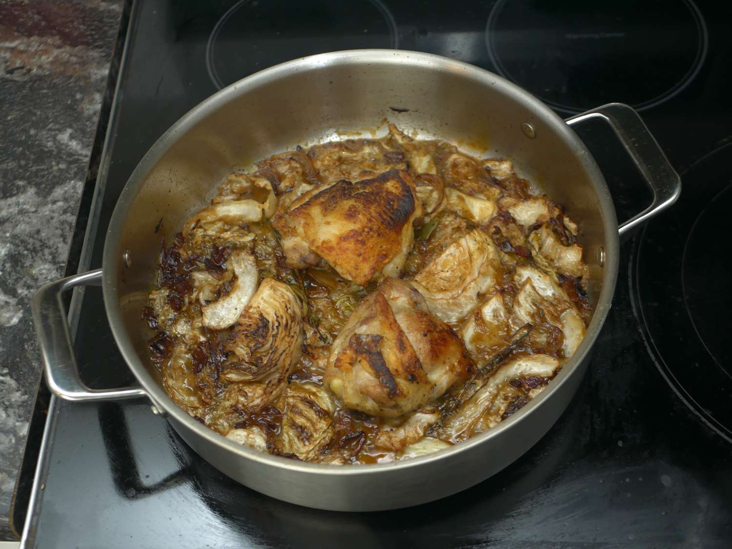 a rondeau with braised chicken and cabbage 