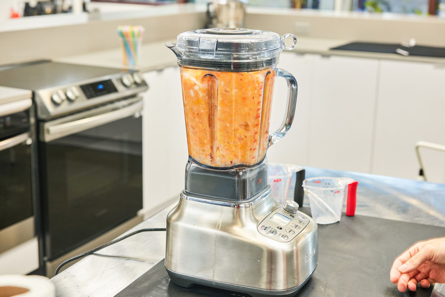 Fruit is blended in the Breville Stainless Steel Super Q Blender