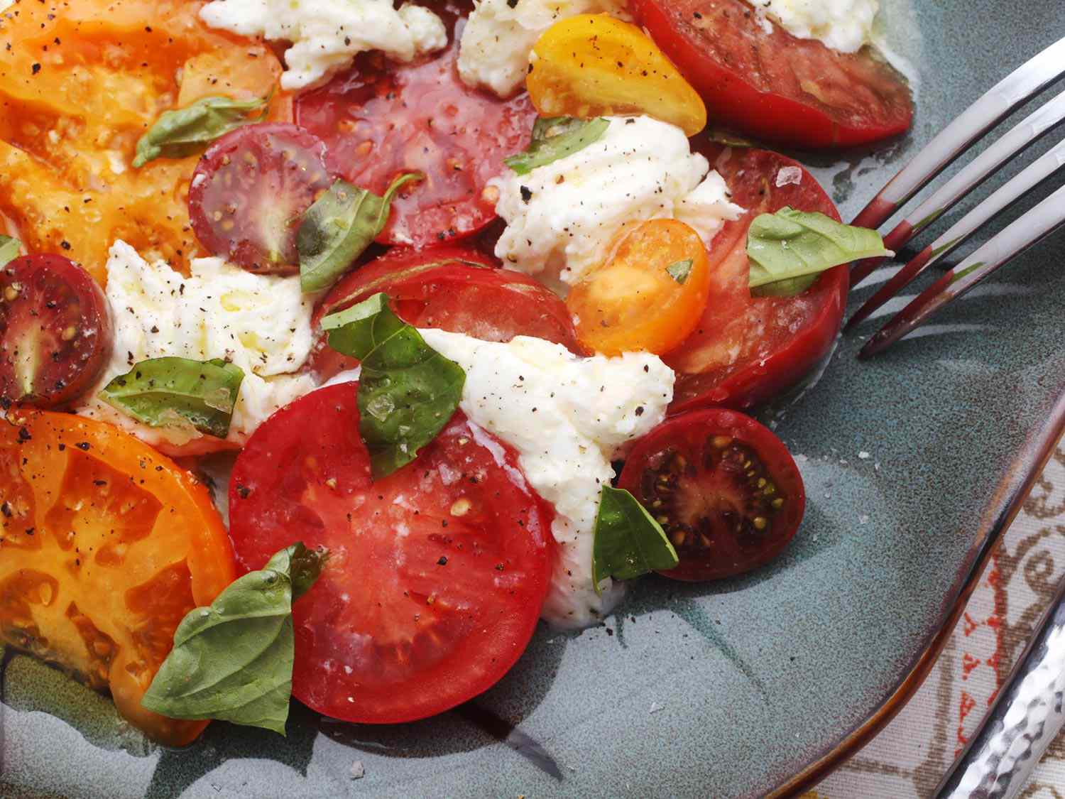 Close-up of Caprese salad on a serving plate. 