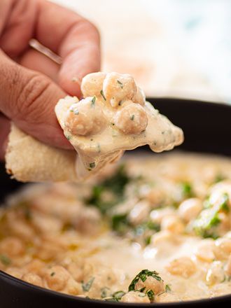 Scoop of hummus masbacha