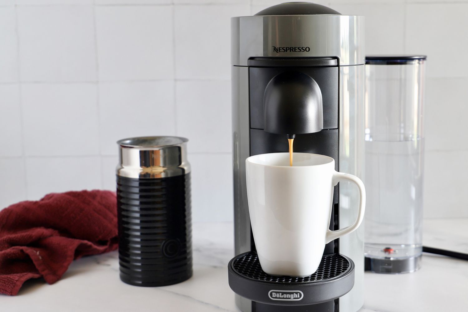 The Nespresso VertuoPlus Coffee and Espresso Machine by De'Longhi dispensing coffee into a mug