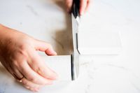 Person sharpening knife with HORL 3 Cruise Knife Sharpener 