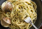 Spaghetti tossed in a sauce with clams, garlic, white wine and chile flakes.