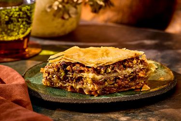 Slice of carrot cake baklava on a plate
