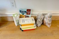 Purple Carrot meal ingredients on a wood surface