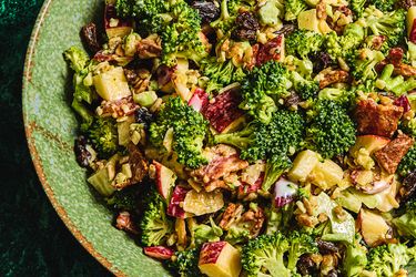 Bowl of broccoli salad with assorted toppings
