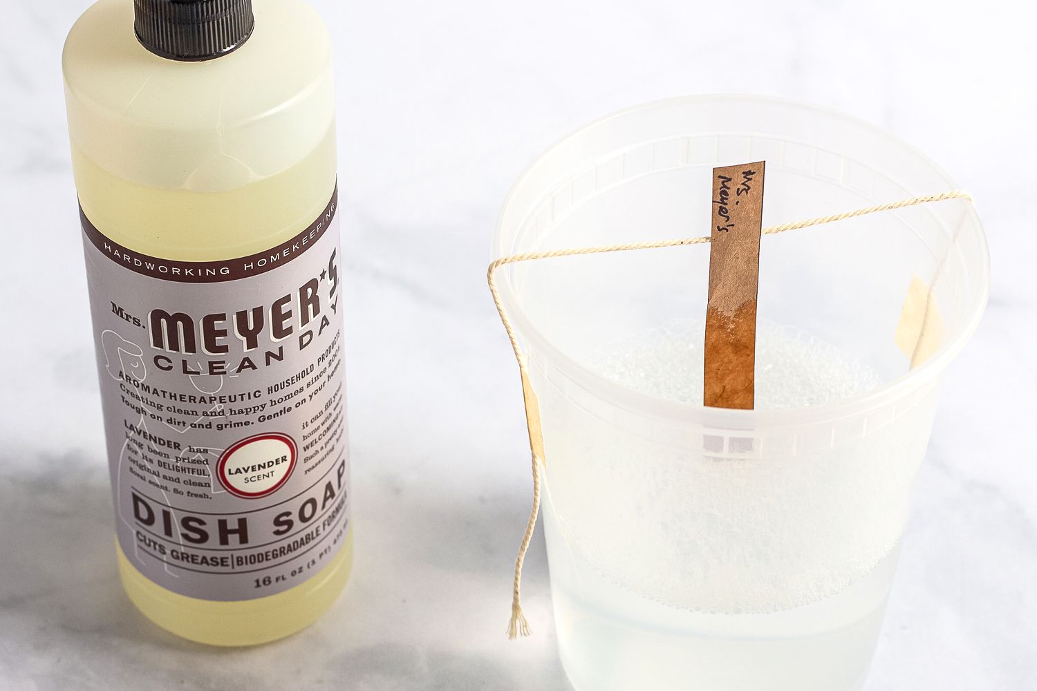 Mrs. Meyer’s Clean Day Liquid Dish Soap on counter in container