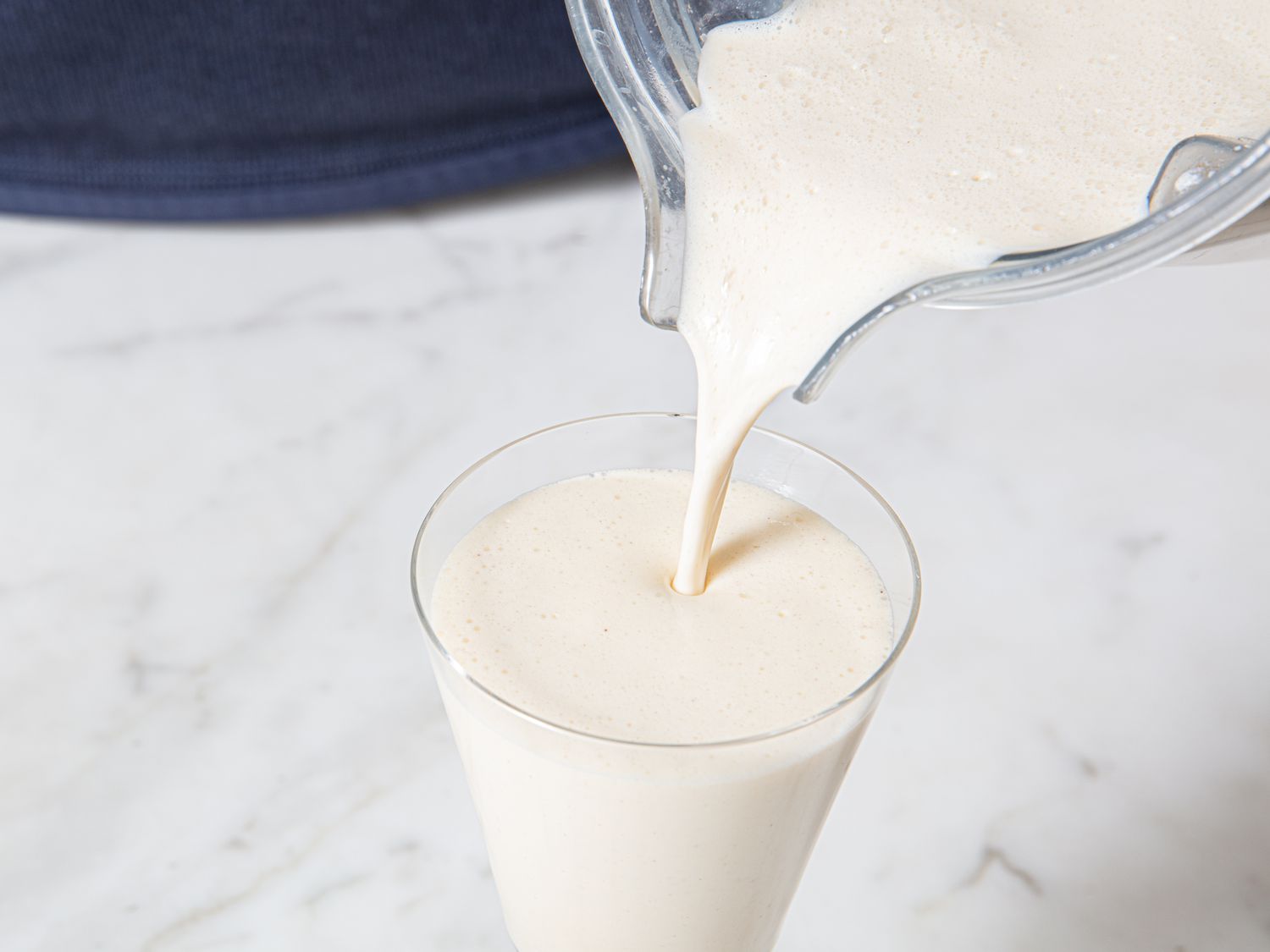 Overhead view of pouring into glass