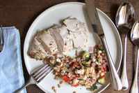 Made In Flatware next to a plate of food