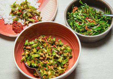 Angled view of multiple bowls of kerabu