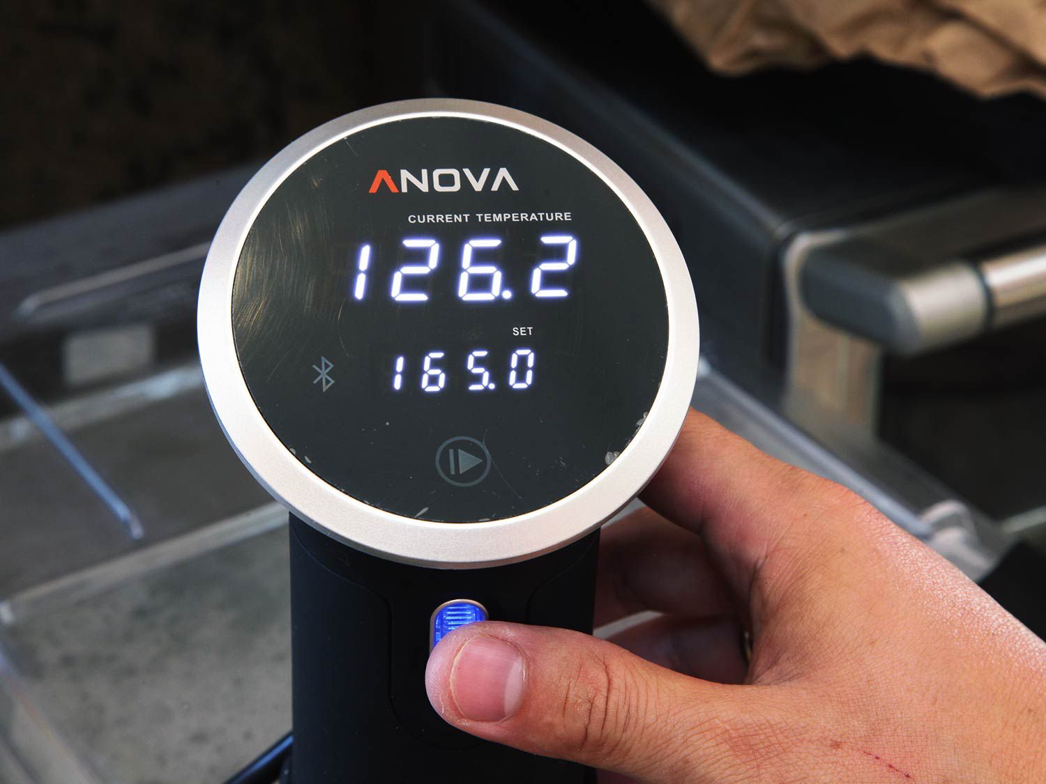 Setting immersion circulator to 165F to cook sous vide carnitas.