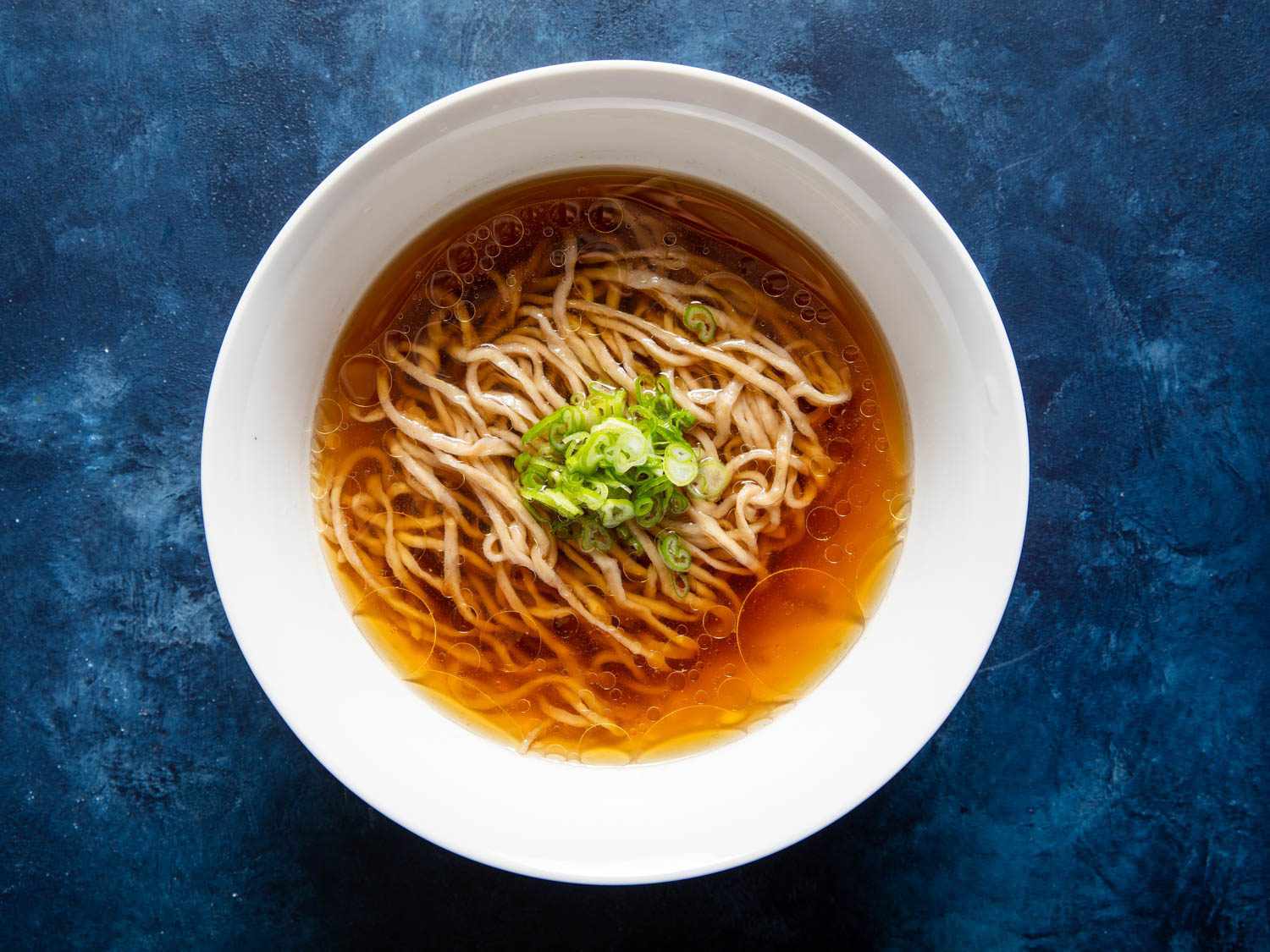 Overhead view of bowl of ramen with temomi noodles