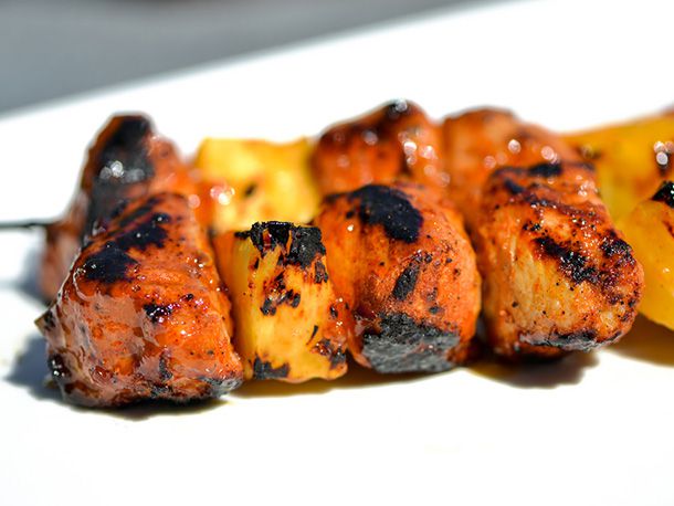 Closeup of Sweet and Spicy Apricot-Glazed Pork and Pineapple Kebabs
