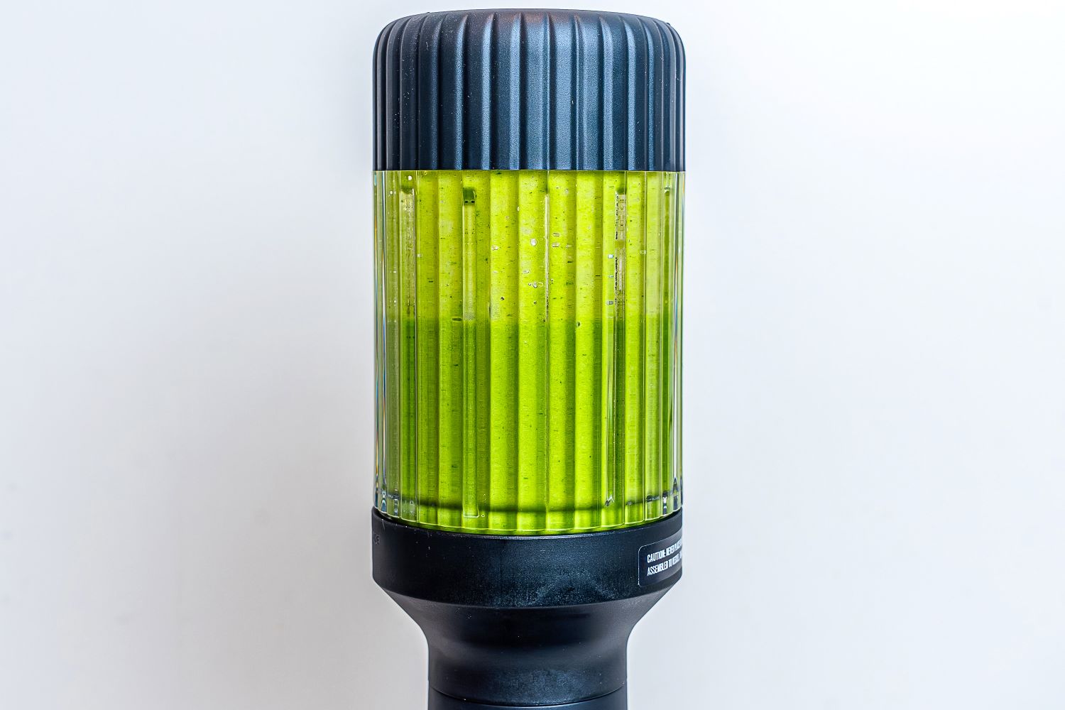 Closeup of greens blending in the Beast Mega 1200 Blender