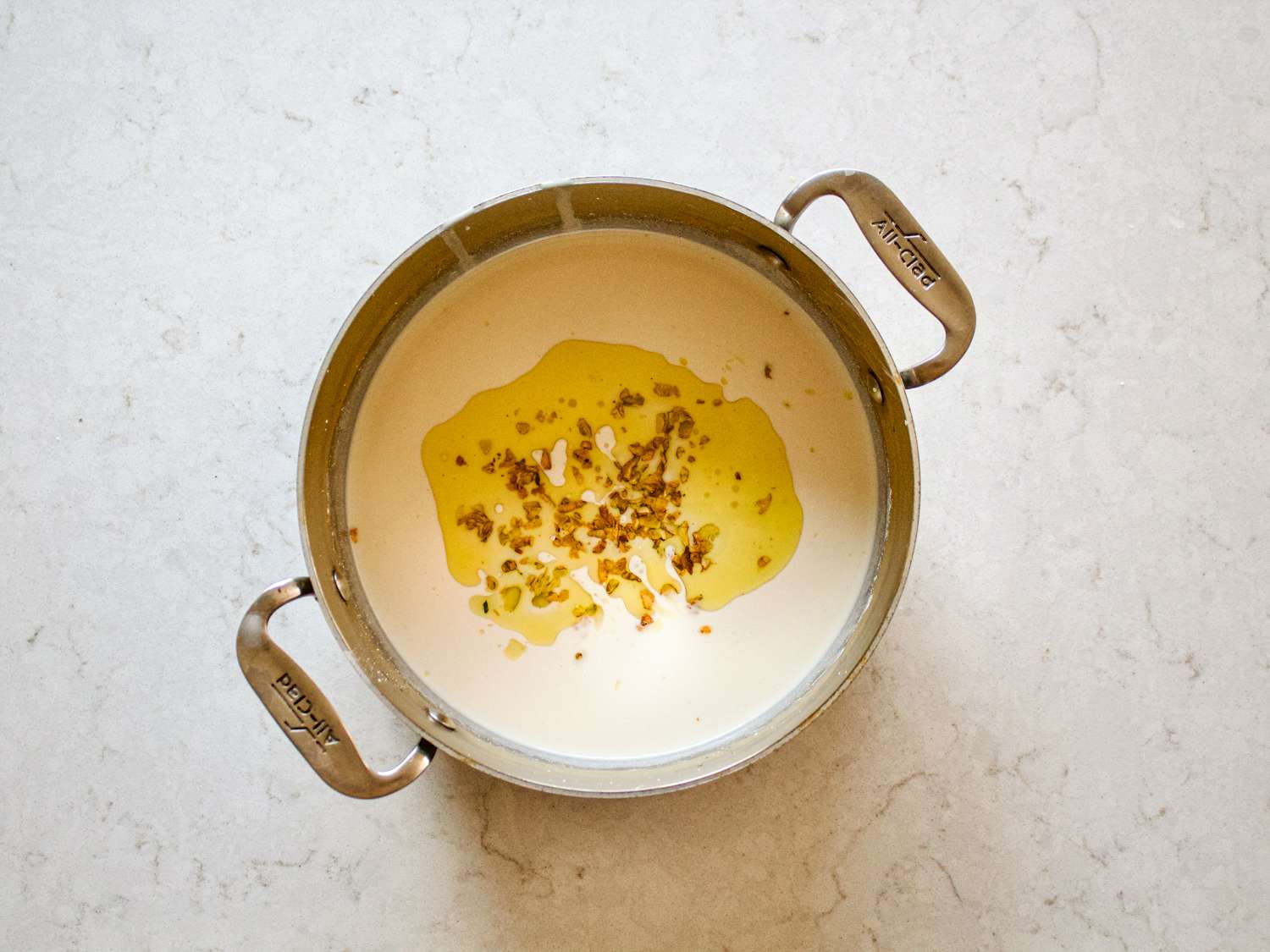 Garlic and oil added to yogurt mixture