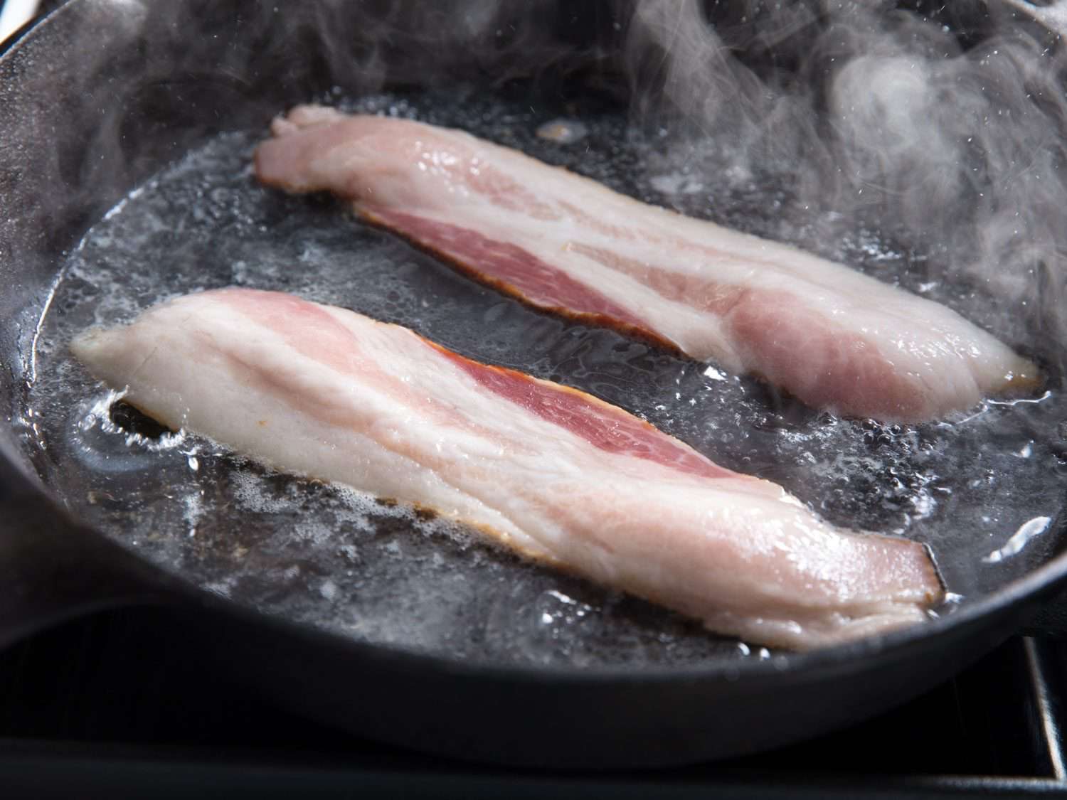 starting skillet bacon with water before frying