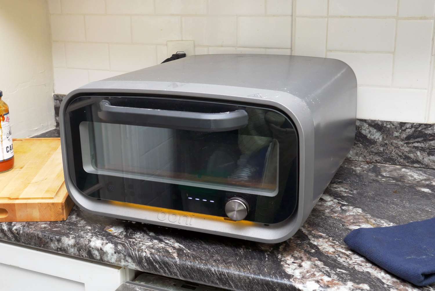 the ooni volt 2 pizza oven on a countertop